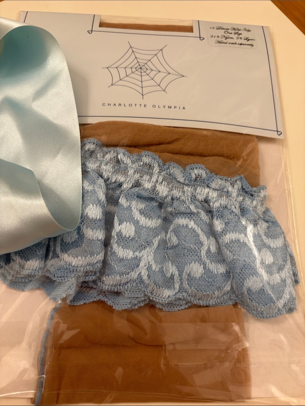Charlotte Olympia Baby Blue Lace-Trim Mini Skirt with Tan Underslip